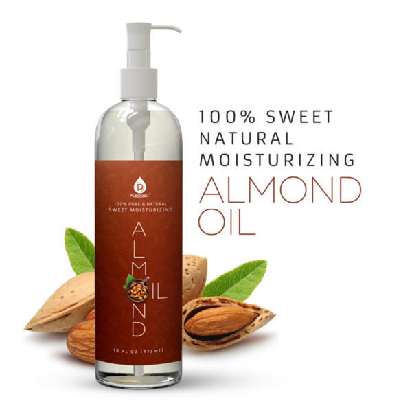 Bottle of almond oil with almonds and leaves on a white background