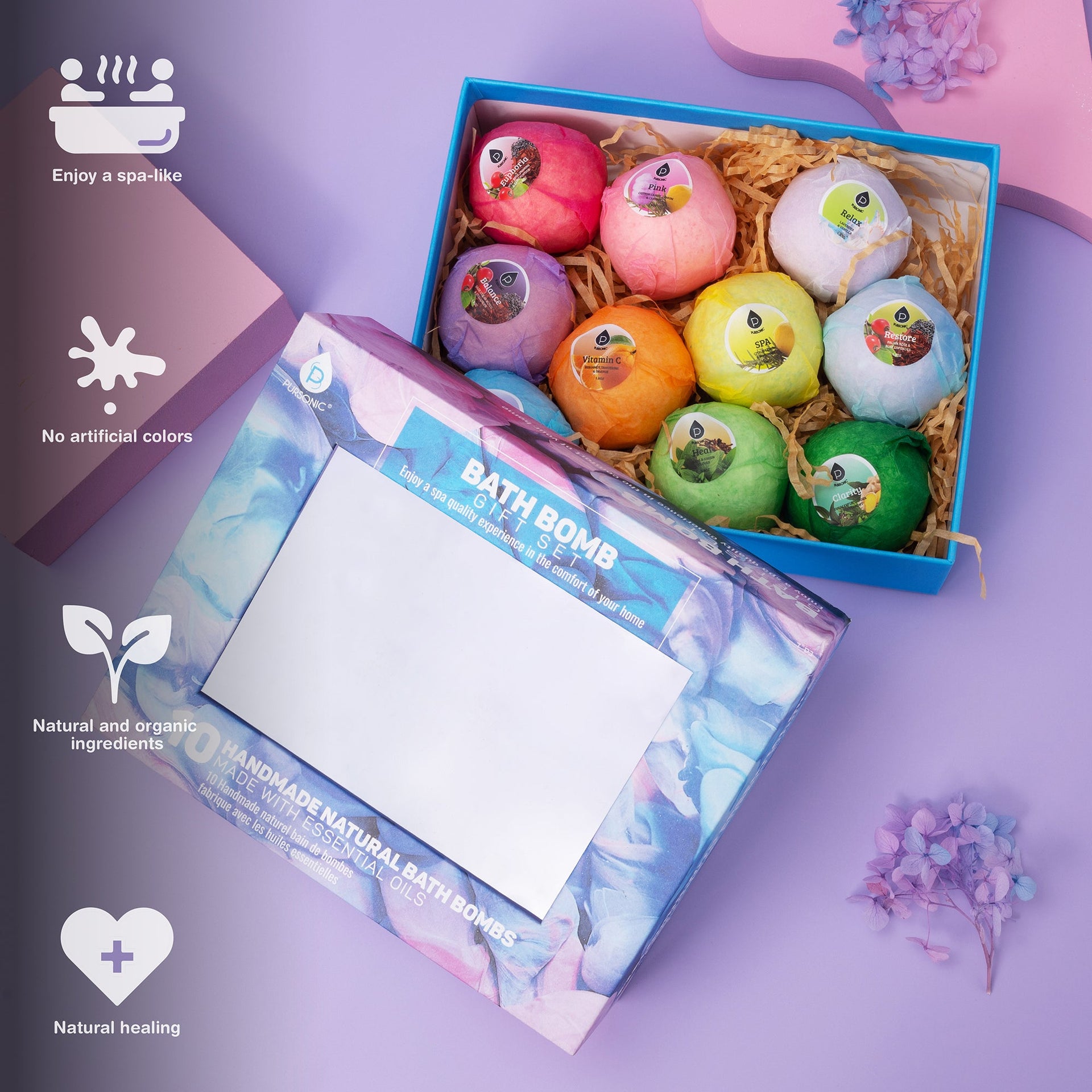 Box of colorful bath bombs with decorative elements on a purple background