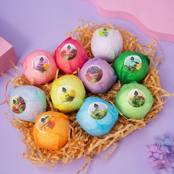 Colorful bath bombs in a decorative nest on a purple background