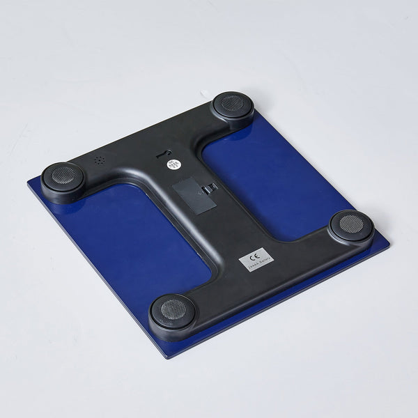 Blue and black digital bathroom scale on a white background