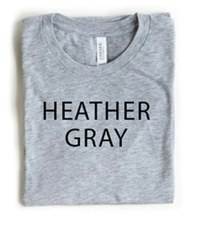 Folded heather gray t-shirt with 'HEATHER GRAY' text on a white background