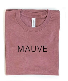 Folded mauve t-shirt with 'MAUVE' text on a white background