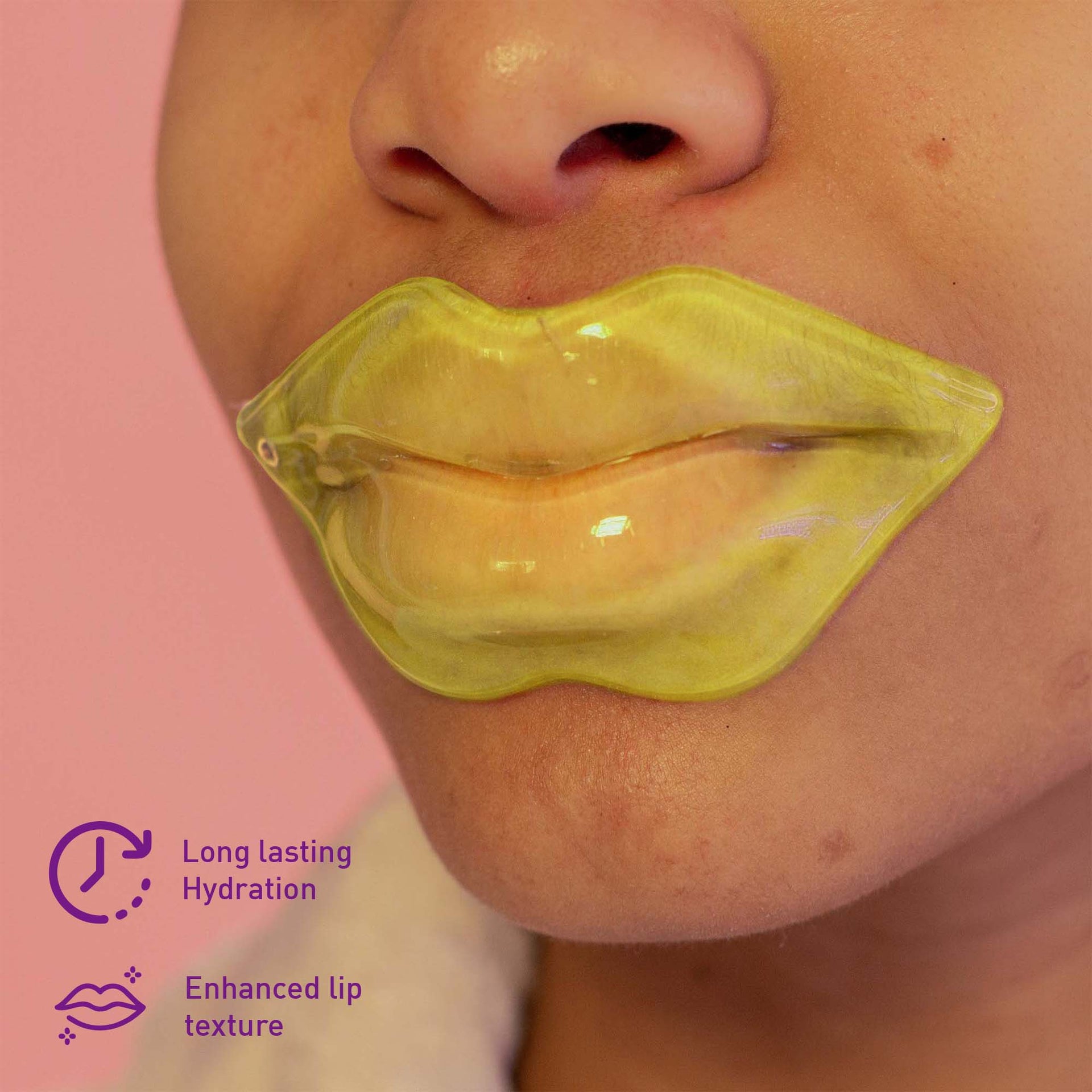 Close-up of lips with a yellow lip balm, showing long-lasting hydration and enhanced lip texture on a pink background.