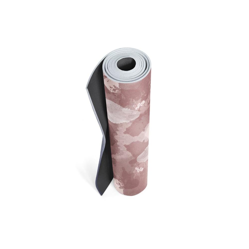 Roll of pink and black patterned yoga mat on a white background.Easy-clean yoga mat made with eco-friendly PVC, wipeable and moisture resistant