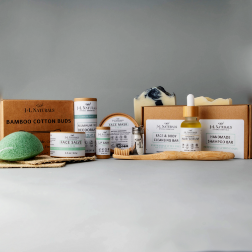 J&L naturals deluxe self care set soaps, toothbrush, shampoo bar, deoderant, cotton swabs, kojnac sponge, face mask