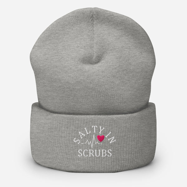 Product mockup of light grey winter hat with salty in scrubs logo