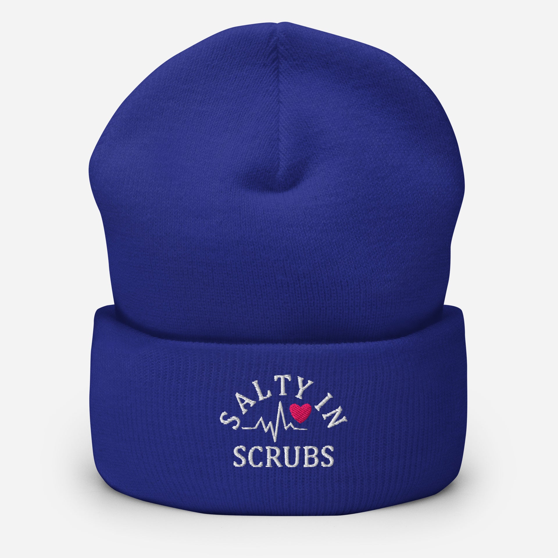 Product mockup of royal blue winter hat with salty in scrubs logo