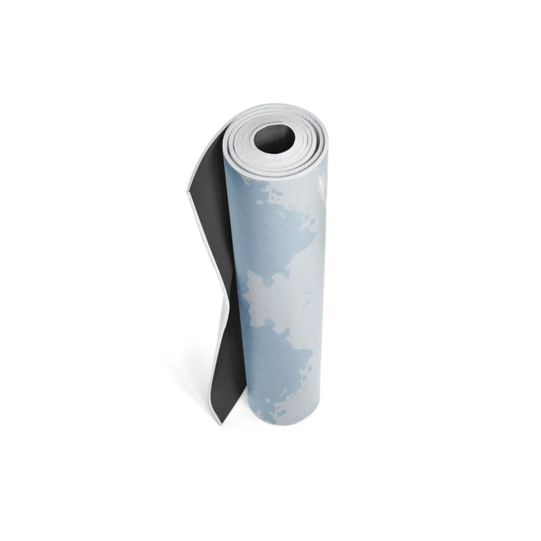 Rolled up yoga mat with a camouflage pattern on a white background